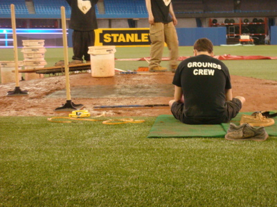 Grounds Crew Hard at Work on the Mound